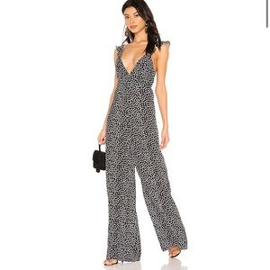 Jumpsuit in black and white polka dots
